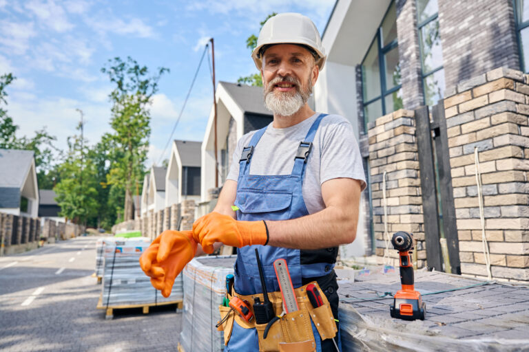 Contractor prepping to work on a job while also learning about the importance of SEO for contractors